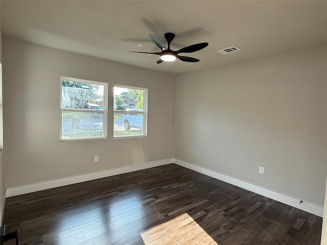 7118 Arborcrest Dr, Dallas, TX 75232 - unfurnished room featuring dark wood-type flooring and a ceiling fan