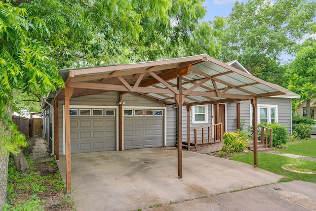 211 Second St, Denton, TX 76201 - view of front of property featuring an attached garage, driveway, and a carport