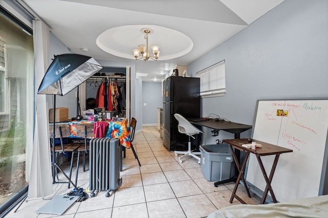 211 Second St, Denton, TX 76201 - dining room with a chandelier, light tile patterned floors, a raised ceiling, and a desk