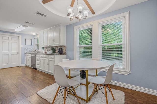 211 Second St, Denton, TX 76201 - dining space featuring dark wood-type flooring and a chandelier