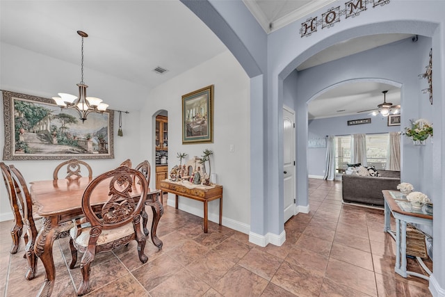 224 Cimmarron Vista Ct, Runaway Bay, TX 76426 - dining area featuring a chandelier, ceiling fan, ornamental molding, and arched walkways