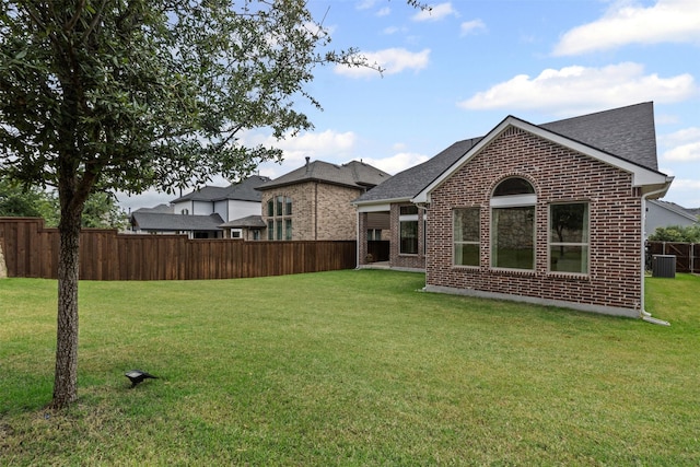 1924 Grey Bark St, Fort Worth, TX 76008 - rear view of property with brick siding and a shingled roof