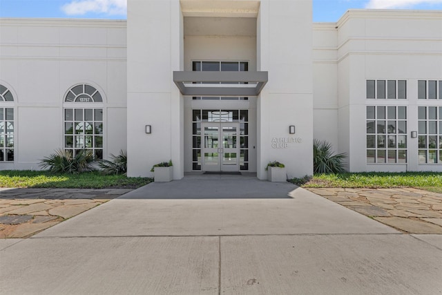 1924 Grey Bark St, Fort Worth, TX 76008 - property entrance with french doors and stucco siding