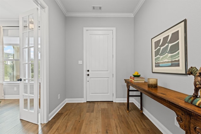 1924 Grey Bark St, Fort Worth, TX 76008 - foyer with wood finished floors and crown molding