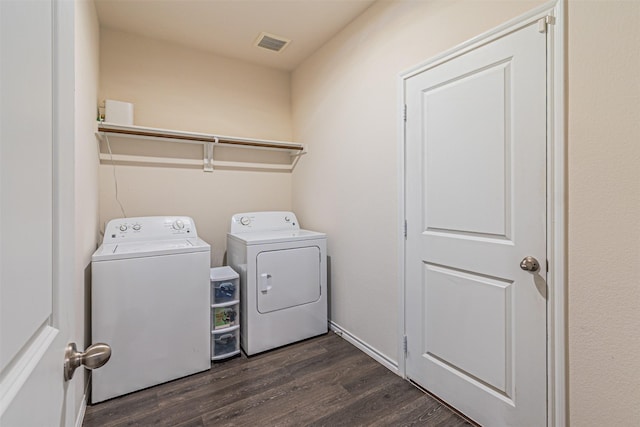 3233 Perman Dr, Mesquite, TX 75126 - laundry room featuring independent washer and dryer and dark wood-type flooring