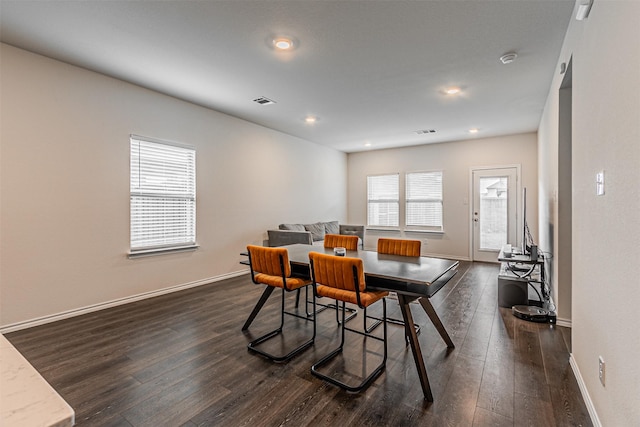 3233 Perman Dr, Mesquite, TX 75126 - dining area with dark wood-type flooring and recessed lighting