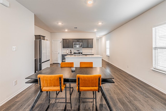 3233 Perman Dr, Mesquite, TX 75126 - dining area featuring dark wood finished floors and recessed lighting