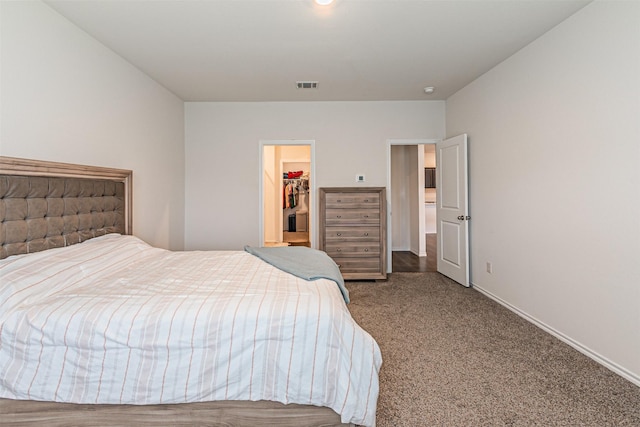 3233 Perman Dr, Mesquite, TX 75126 - carpeted bedroom featuring a spacious closet and a closet
