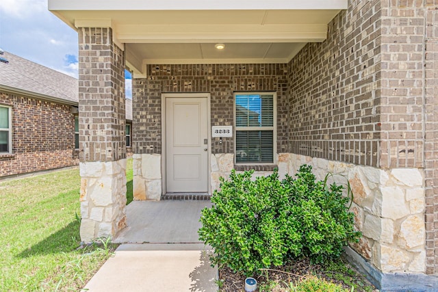3233 Perman Dr, Mesquite, TX 75126 - entrance to property with a porch, brick siding, and stone siding