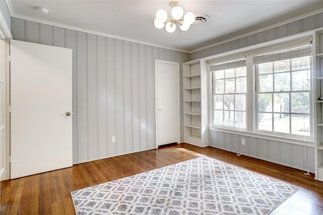 3609 Rogers Ave, Fort Worth, TX 76109 - unfurnished bedroom with a chandelier, ornamental molding, and wood finished floors