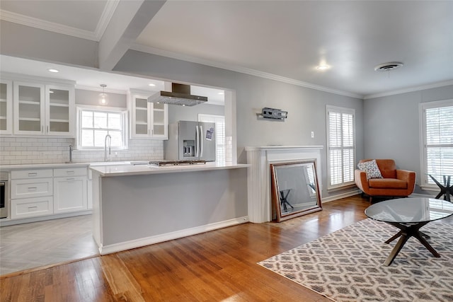 3609 Rogers Ave, Fort Worth, TX 76109 - living room featuring plenty of natural light, light wood finished floors, crown molding, and recessed lighting