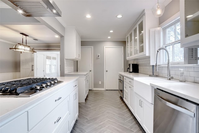 3609 Rogers Ave, Fort Worth, TX 76109 - kitchen featuring appliances with stainless steel finishes, range hood, backsplash, crown molding, and recessed lighting
