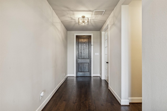 7401 Winterbloom Way, Fort Worth, TX 76123 - entryway featuring baseboards and dark wood-style floors
