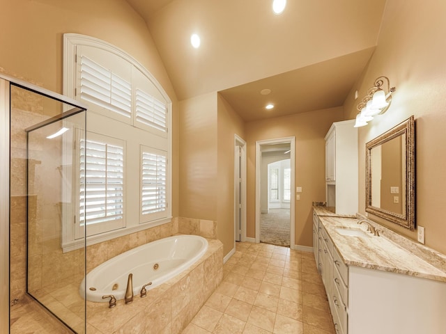 1016 Lighthouse Ct, Grand Prairie, TX 75104 - full bath featuring a whirlpool tub, a stall shower, vanity, recessed lighting, and high vaulted ceiling