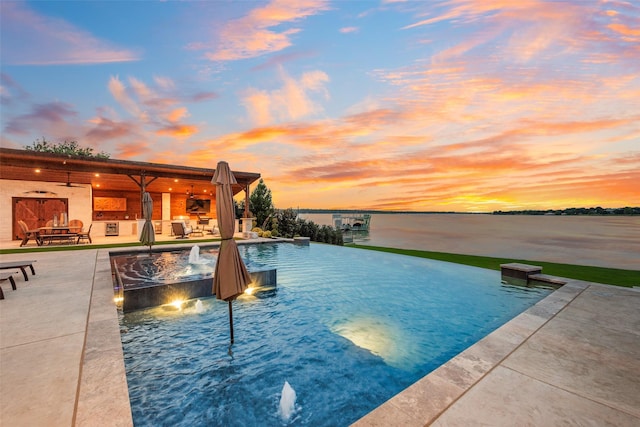 12624 Lake Shore Ct N, Fort Worth, TX 76179 - pool at dusk with a ceiling fan and a patio
