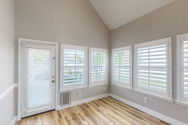 1225 Long Leaf Dr, Savannah, TX 76227 - unfurnished sunroom with vaulted ceiling