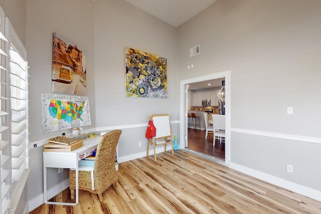 1225 Long Leaf Dr, Savannah, TX 76227 - office featuring wood finished floors and a towering ceiling
