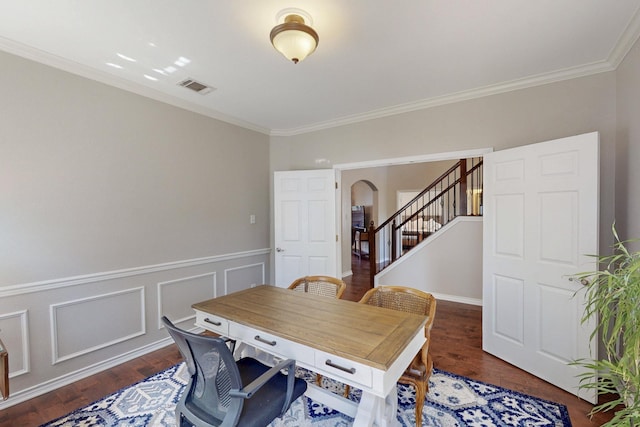 1225 Long Leaf Dr, Savannah, TX 76227 - dining area featuring arched walkways, stairway, ornamental molding, wood finished floors, and a wainscoted wall
