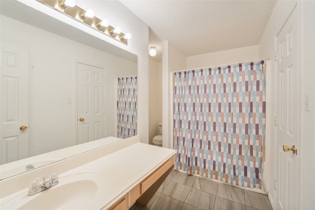 202 Lancelot Dr, Weatherford, TX 76086 - full bathroom with vanity, a textured ceiling, tile patterned floors, and a shower with curtain