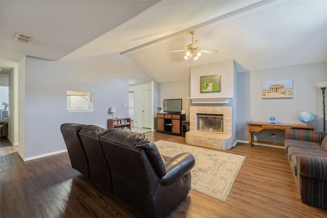 202 Lancelot Dr, Weatherford, TX 76086 - living room with ceiling fan, wood finished floors, and a brick fireplace