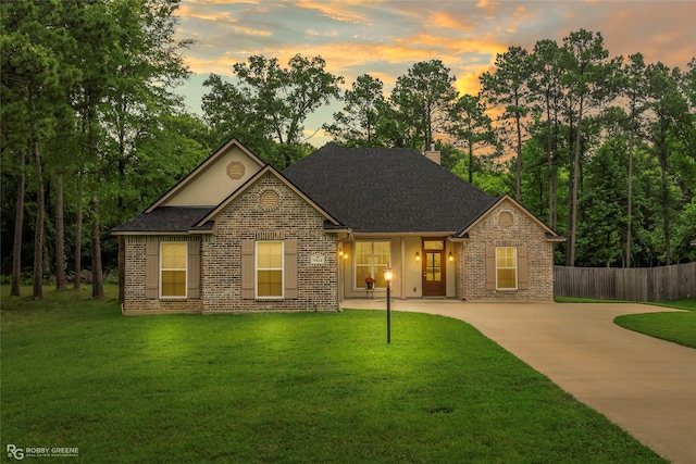 9424 N Pointe Cir, Greenwood, LA 71033 - traditional-style house with brick siding, concrete driveway, and roof with shingles
