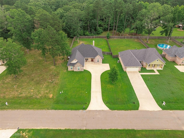 9424 N Pointe Cir, Greenwood, LA 71033 - aerial view of property and surrounding area featuring a heavily wooded area