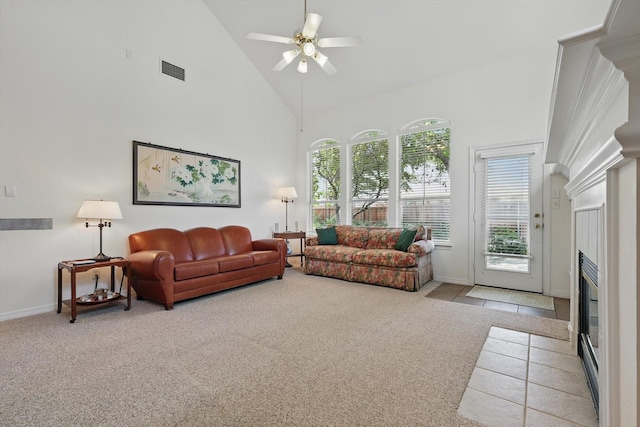 7939 Xavier Ct, Dallas, TX 75218 - living area with carpet flooring, high vaulted ceiling, a ceiling fan, and a fireplace with flush hearth