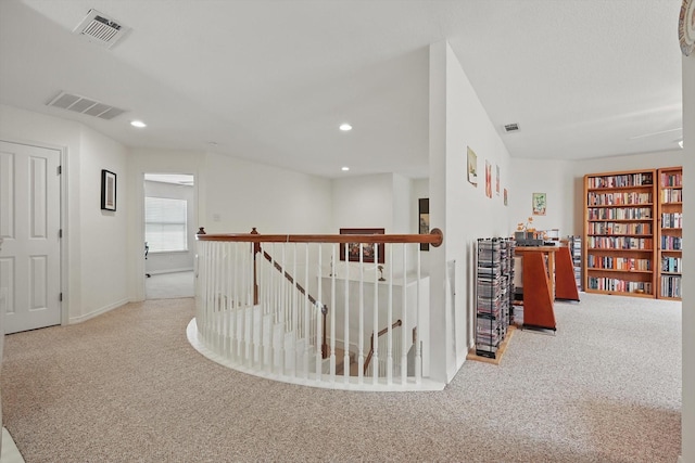 7939 Xavier Ct, Dallas, TX 75218 - hall featuring an upstairs landing, carpet flooring, and recessed lighting