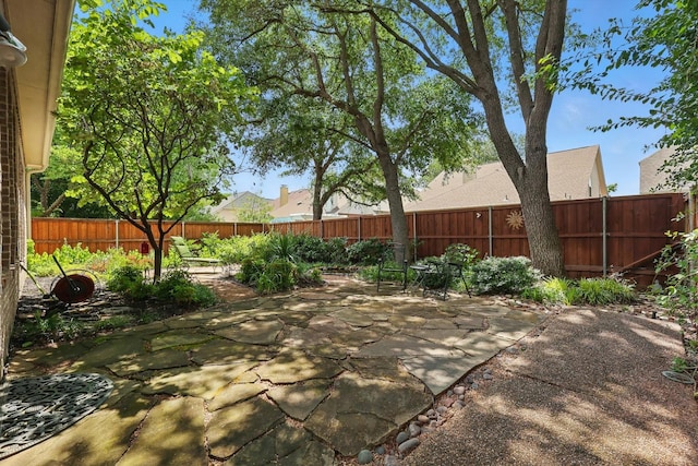 7939 Xavier Ct, Dallas, TX 75218 - fenced backyard featuring a patio