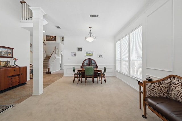 7939 Xavier Ct, Dallas, TX 75218 - dining room with light carpet and stairs