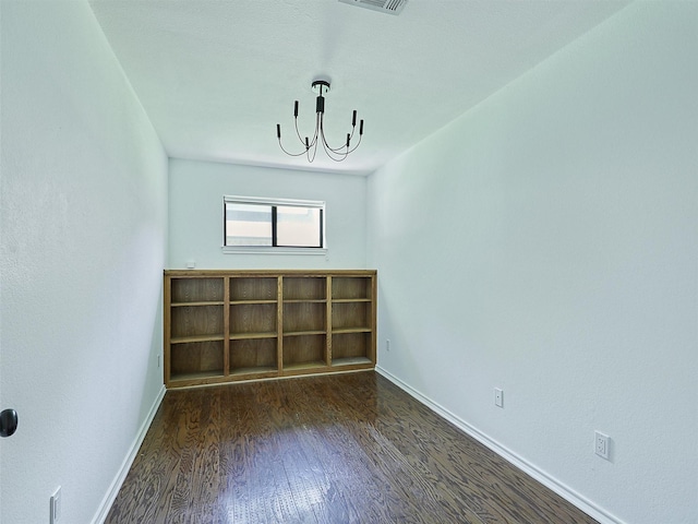 9101 Westwood Shores Dr, Fort Worth, TX 76179 - spare room featuring a chandelier and wood finished floors