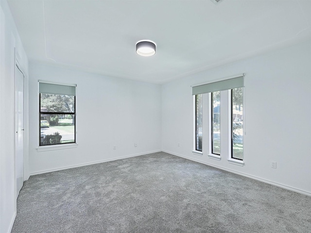 9101 Westwood Shores Dr, Fort Worth, TX 76179 - carpeted spare room featuring baseboards