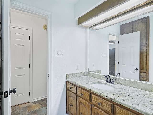 9101 Westwood Shores Dr, Fort Worth, TX 76179 - bathroom with vanity and stone finish flooring