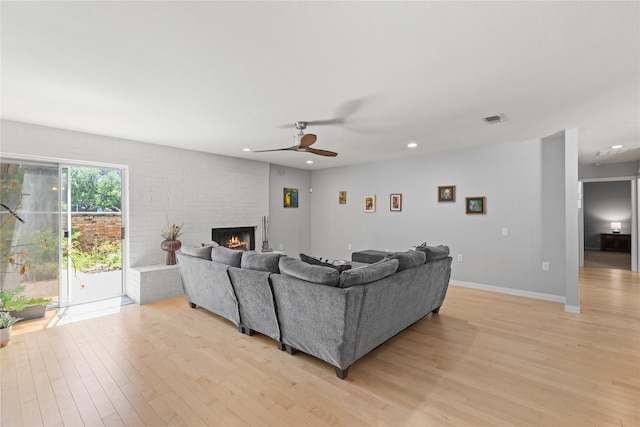 5963 River Bend Dr, Benbrook, TX 76132 - living room featuring light wood-type flooring, ceiling fan, recessed lighting, and a brick fireplace