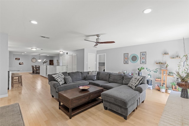 5963 River Bend Dr, Benbrook, TX 76132 - living room with light wood-style floors, ceiling fan, and recessed lighting