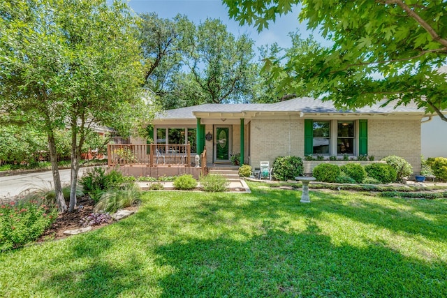 448 Parkhurst Dr, Dallas, TX 75218 - ranch-style house with brick siding, a front yard, and covered porch