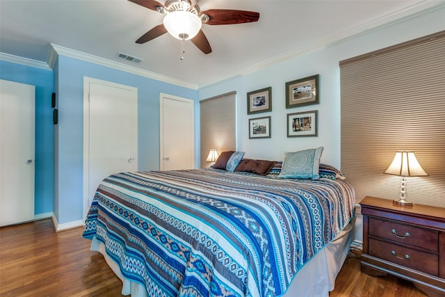 448 Parkhurst Dr, Dallas, TX 75218 - bedroom featuring wood finished floors, crown molding, and ceiling fan