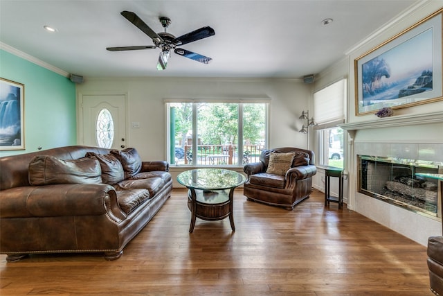448 Parkhurst Dr, Dallas, TX 75218 - living area featuring ornamental molding, wood finished floors, a fireplace, ceiling fan, and recessed lighting
