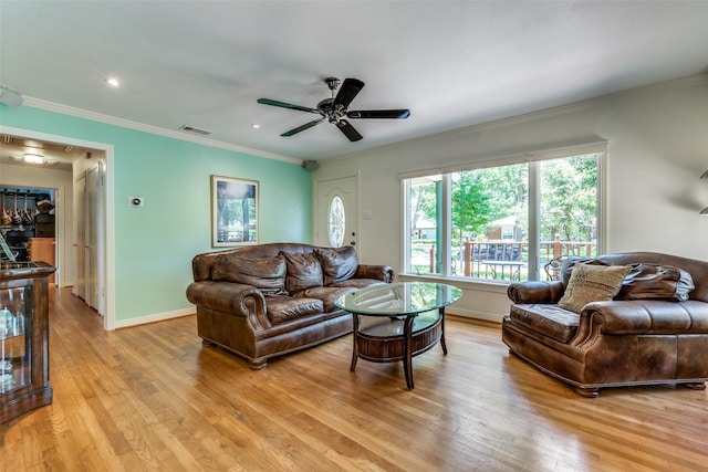 448 Parkhurst Dr, Dallas, TX 75218 - living room with light wood-type flooring, a ceiling fan, crown molding, and recessed lighting