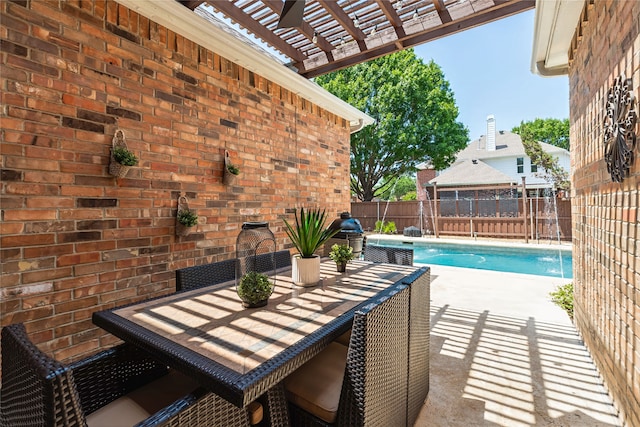 2324 Heather Ridge Dr, Flower Mound, TX 75028 - view of swimming pool featuring a pergola, a fenced backyard, a patio area, outdoor dining space, and area for grilling
