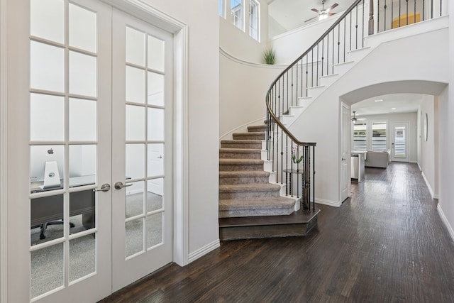 6305 Crossvine Trl, Flower Mound, TX 76226 - foyer with a ceiling fan, french doors, dark wood finished floors, and a high ceiling