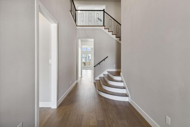 4131 Sandhills Ln, Prosper, TX 75078 - stairs featuring wood finished floors and baseboards