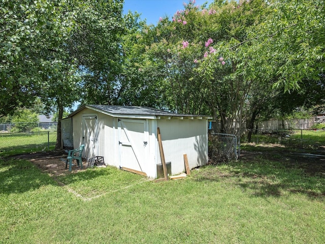301 Redbud, Ferris, TX 75125 - view of shed featuring a fenced backyard