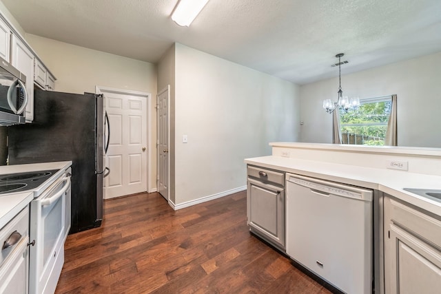 113 N W A Allen Blvd, Wylie, TX 75098 - kitchen with white appliances, dark wood-type flooring, a chandelier, light countertops, and a textured ceiling