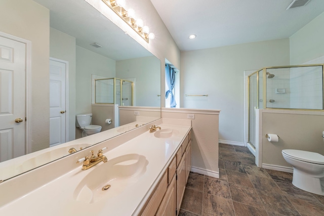 113 N W A Allen Blvd, Wylie, TX 75098 - bathroom featuring double vanity, a stall shower, and stone finish flooring