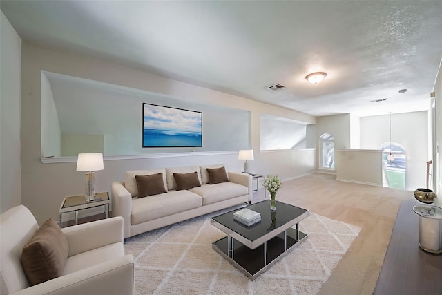 113 N W A Allen Blvd, Wylie, TX 75098 - living room featuring carpet and a chandelier