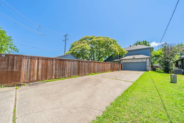 113 N W A Allen Blvd, Wylie, TX 75098 - view of yard with concrete driveway and an attached garage