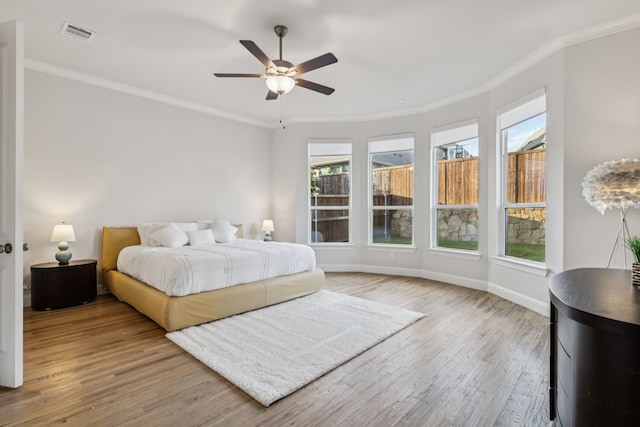 3623 Coldstream Dr, Irving, TX 75063 - bedroom featuring crown molding, wood finished floors, and ceiling fan