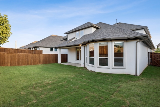 3623 Coldstream Dr, Irving, TX 75063 - back of house featuring a shingled roof, a fenced backyard, and stucco siding