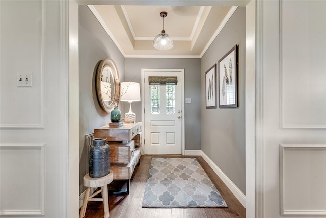 3612 Prather Ct, Arlington, TX 76017 - entryway featuring wood finished floors, ornamental molding, and a raised ceiling